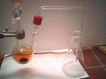 Drip feeding of hydrogen bromide solution; reaction begins